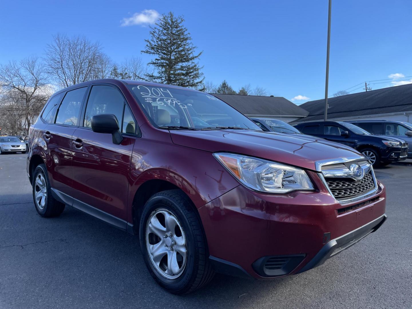 2014 burgandy Subaru Forester 2.5i (JF2SJAAC0EH) with an 2.5L H4 SOHC 16V engine, 6-Speed Automatic transmission, located at 101 N. Main Street, Muncy, PA, 17756, (570) 546-5462, 41.207691, -76.785942 - Photo#1