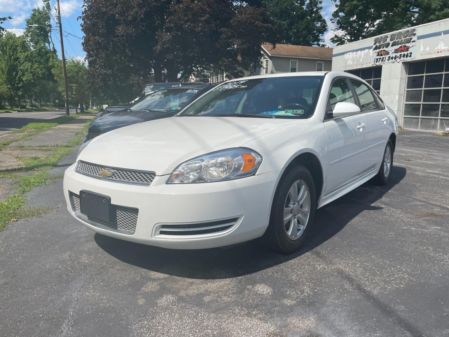 2014 White Chevrolet Impala LS (2G1WA5E34E1) with an 3.6L V6 DOHC 16V FFV engine, 6-Speed Automatic transmission, located at 101 N. Main Street, Muncy, PA, 17756, (570) 546-5462, 41.207691, -76.785942 - Photo#1