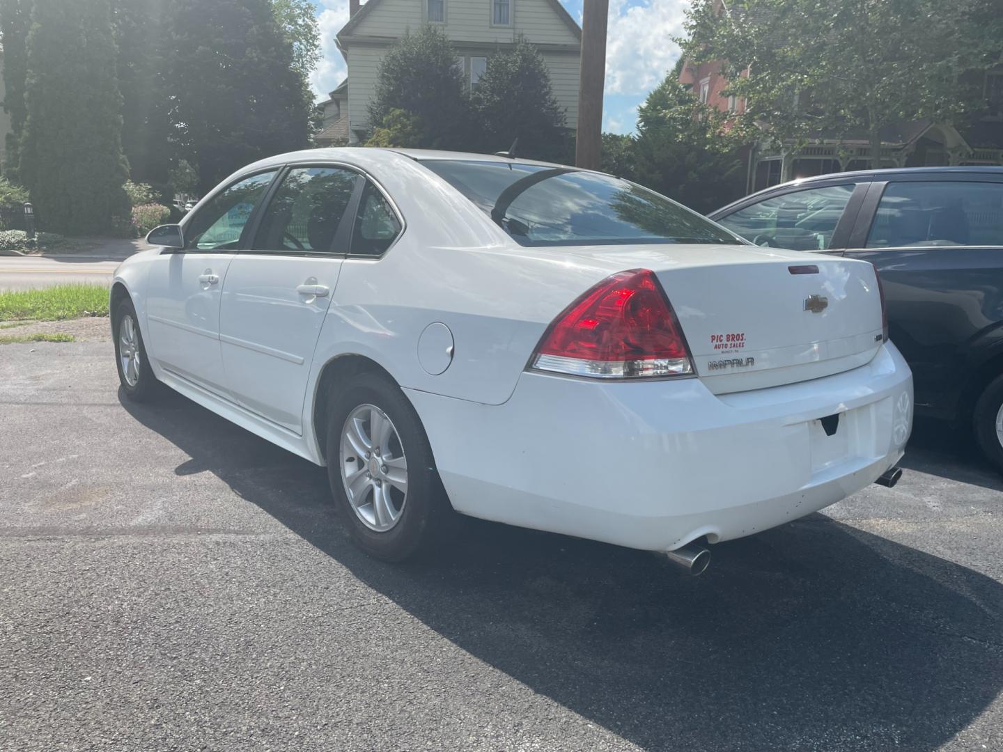 2014 White Chevrolet Impala LS (2G1WA5E34E1) with an 3.6L V6 DOHC 16V FFV engine, 6-Speed Automatic transmission, located at 101 N. Main Street, Muncy, PA, 17756, (570) 546-5462, 41.207691, -76.785942 - Photo#2
