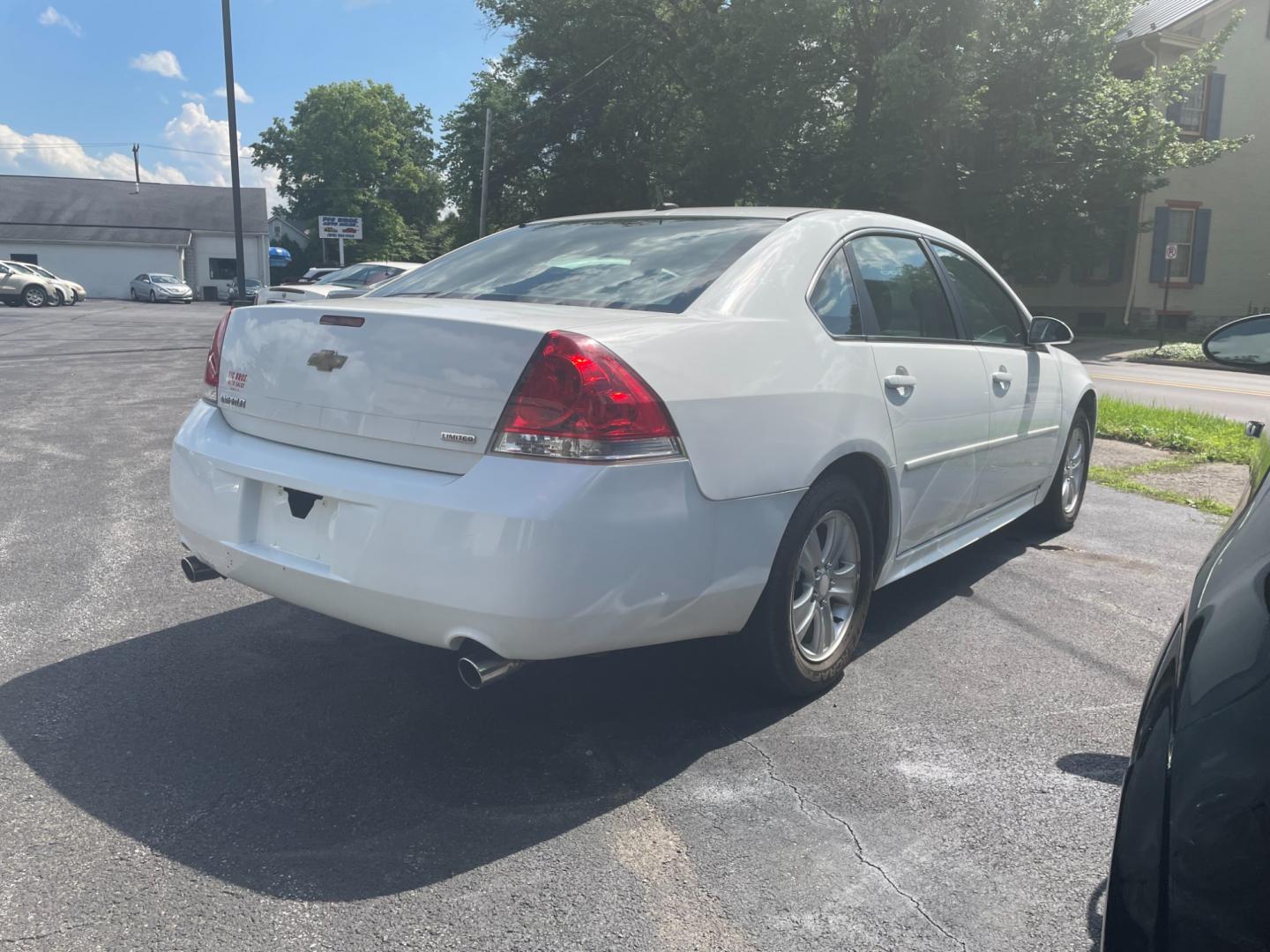 2014 White Chevrolet Impala LS (2G1WA5E34E1) with an 3.6L V6 DOHC 16V FFV engine, 6-Speed Automatic transmission, located at 101 N. Main Street, Muncy, PA, 17756, (570) 546-5462, 41.207691, -76.785942 - Photo#3