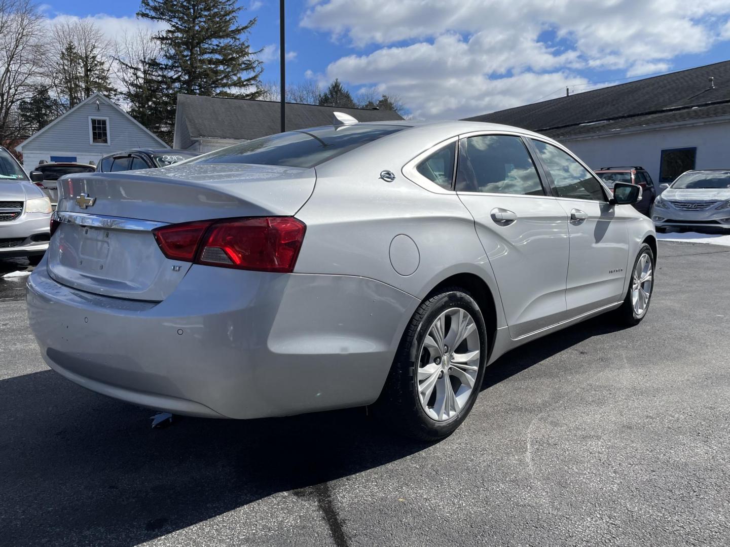 2015 silver Chevrolet Impala 2LT (1G1125S34FU) with an 3.6L V6 DOHC 24V FFV engine, 6-Speed Automatic transmission, located at 101 N. Main Street, Muncy, PA, 17756, (570) 546-5462, 41.207691, -76.785942 - Photo#2