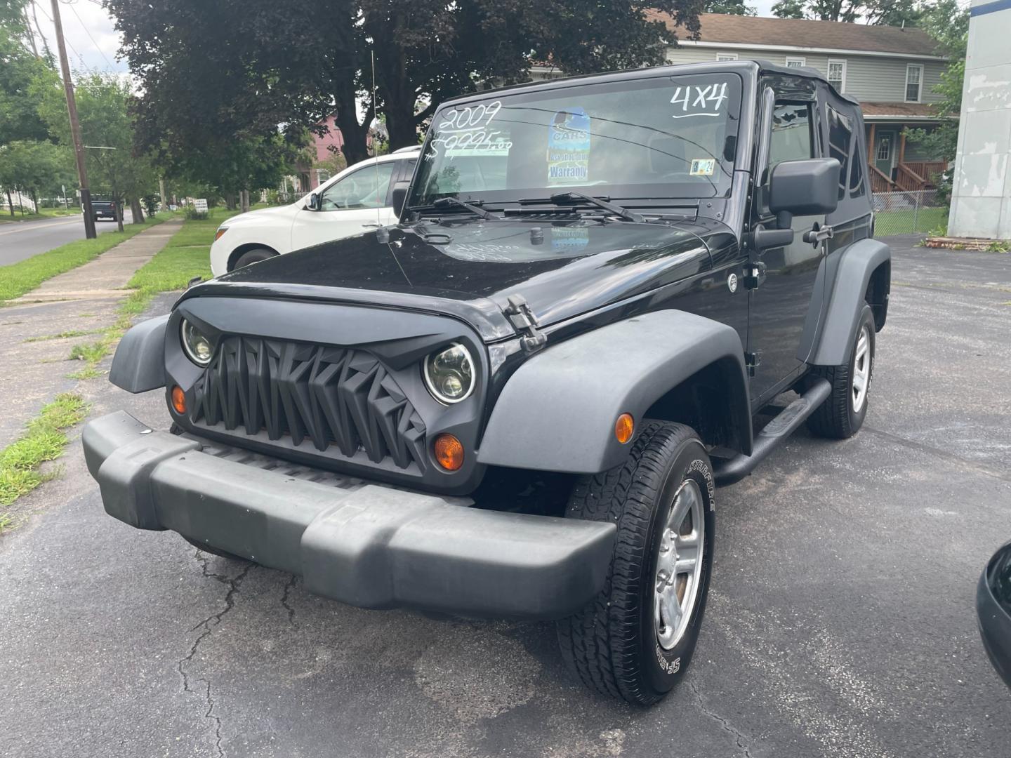 2009 black Jeep Wrangler X (1J4FA24159L) with an 3.8L V6 OHV 12V engine, located at 101 N. Main Street, Muncy, PA, 17756, (570) 546-5462, 41.207691, -76.785942 - Photo#1