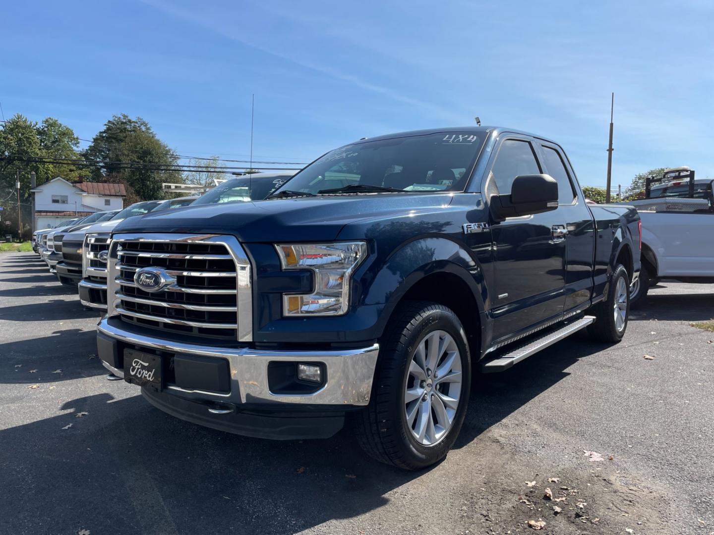 2015 blue Ford F-150 Lariat SuperCab 6.5-ft. Bed 4WD (1FTEX1EP5FF) with an 2.7L V6 DOHC 24V engine, 6-Speed Automatic transmission, located at 101 N. Main Street, Muncy, PA, 17756, (570) 546-5462, 41.207691, -76.785942 - Photo#0