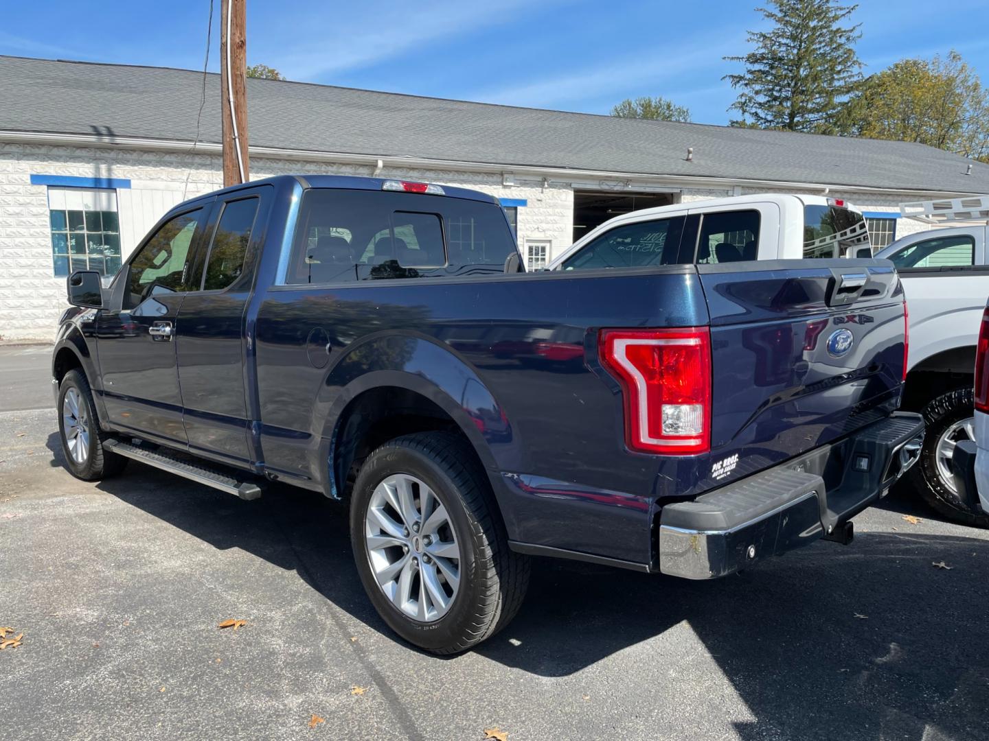 2015 blue Ford F-150 Lariat SuperCab 6.5-ft. Bed 4WD (1FTEX1EP5FF) with an 2.7L V6 DOHC 24V engine, 6-Speed Automatic transmission, located at 101 N. Main Street, Muncy, PA, 17756, (570) 546-5462, 41.207691, -76.785942 - Photo#2