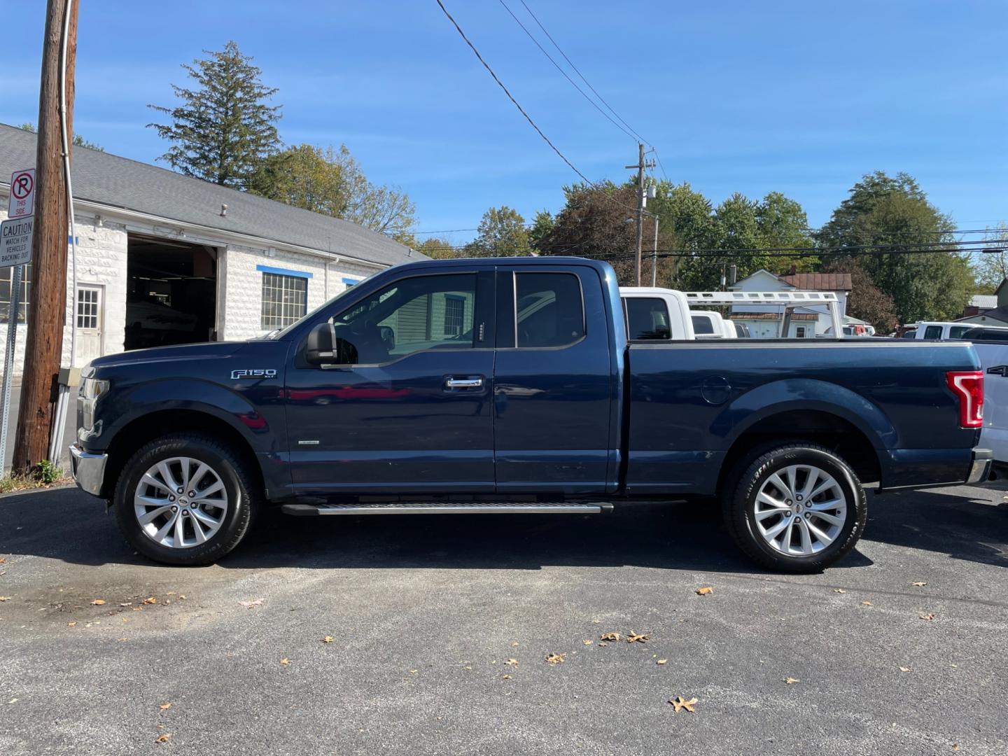 2015 blue Ford F-150 Lariat SuperCab 6.5-ft. Bed 4WD (1FTEX1EP5FF) with an 2.7L V6 DOHC 24V engine, 6-Speed Automatic transmission, located at 101 N. Main Street, Muncy, PA, 17756, (570) 546-5462, 41.207691, -76.785942 - Photo#4