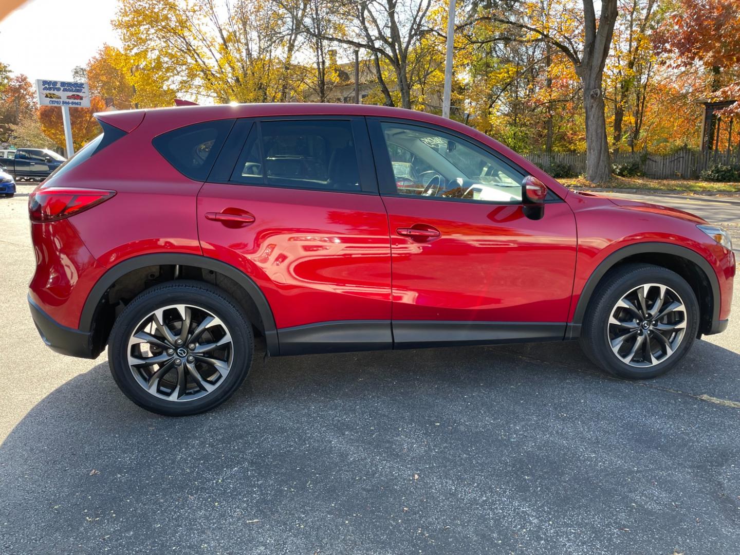 2016 Red Mazda CX-5 Grand Touring AWD (JM3KE4DY0G0) with an 2.5L L4 DOHC 16V engine, 6-Speed Automatic transmission, located at 101 N. Main Street, Muncy, PA, 17756, (570) 546-5462, 41.207691, -76.785942 - Photo#5