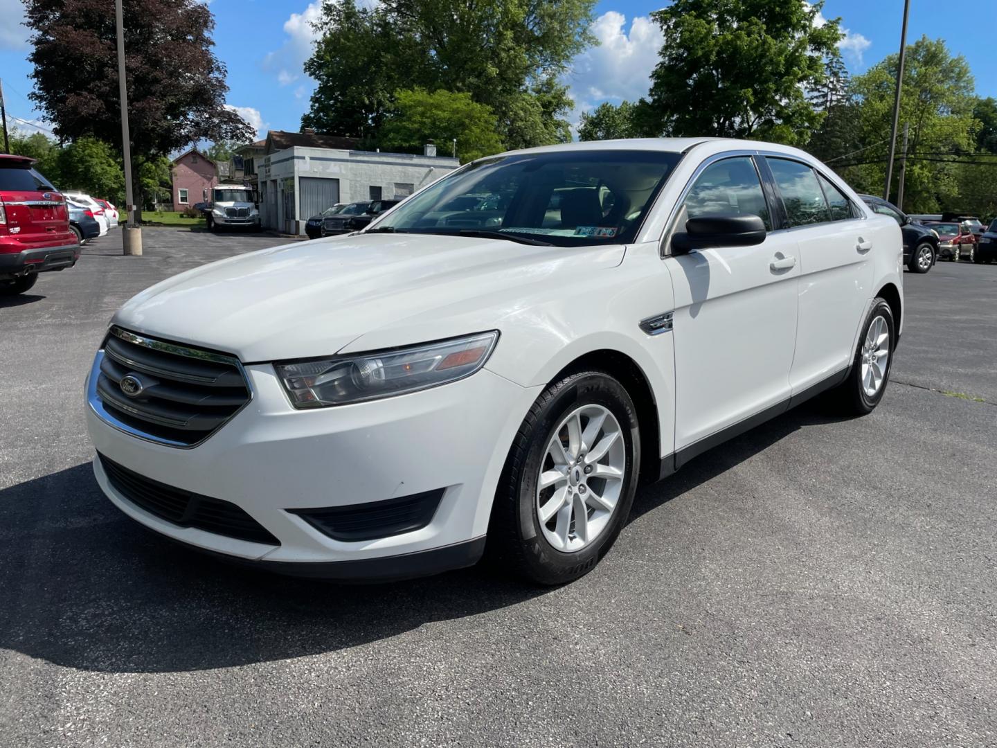 2013 White Ford Taurus SE FWD (1FAHP2D85DG) with an 3.5L V6 DOHC 24V engine, 6-Speed Automatic transmission, located at 101 N. Main Street, Muncy, PA, 17756, (570) 546-5462, 41.207691, -76.785942 - Photo#0