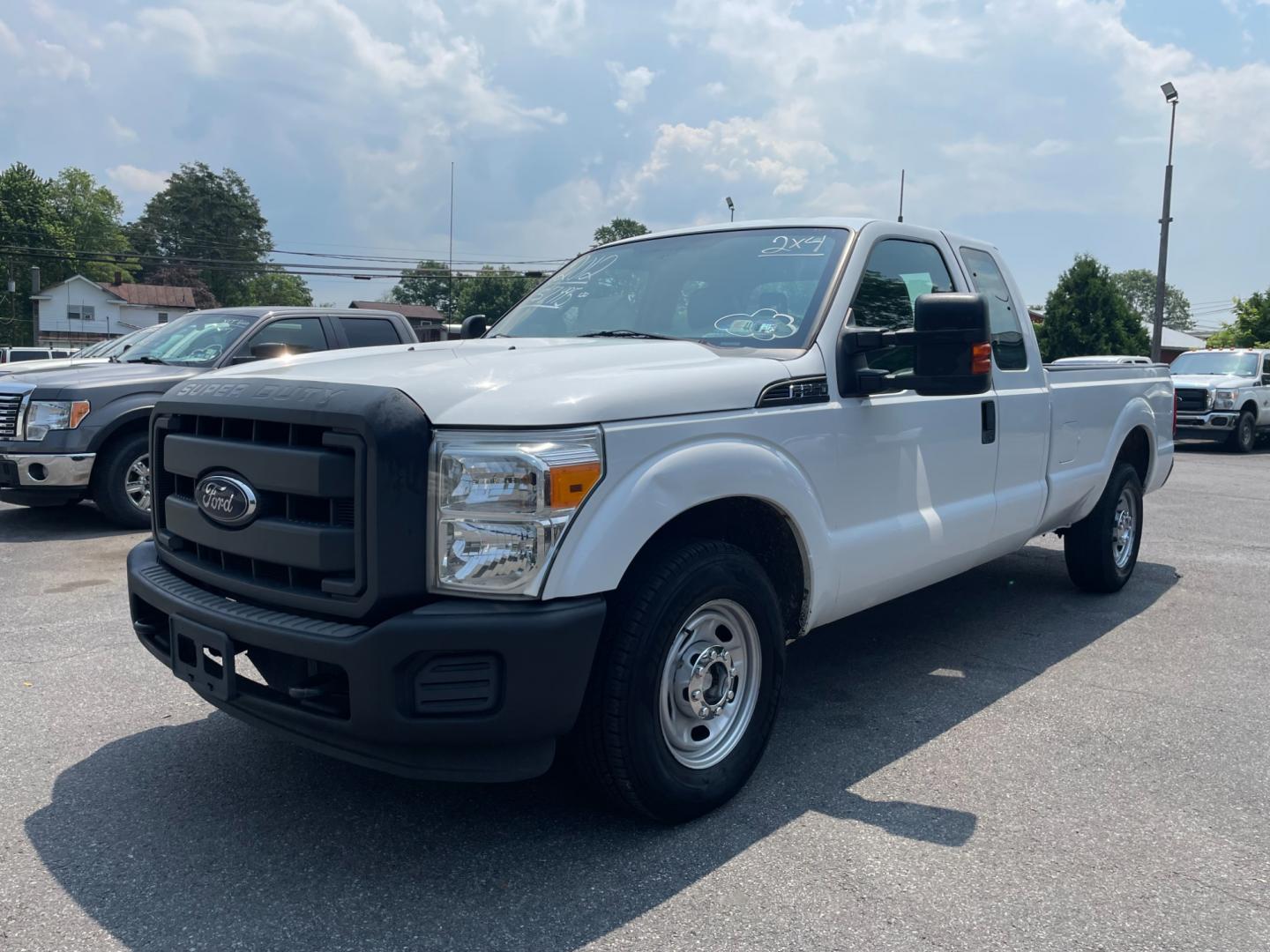 2012 White Ford F-250 SD Lariat SuperCab 2WD (1FT7X2A67CE) with an 6.2L V8 OHV 16V engine, 6-Speed Automatic transmission, located at 101 N. Main Street, Muncy, PA, 17756, (570) 546-5462, 41.207691, -76.785942 - Photo#1