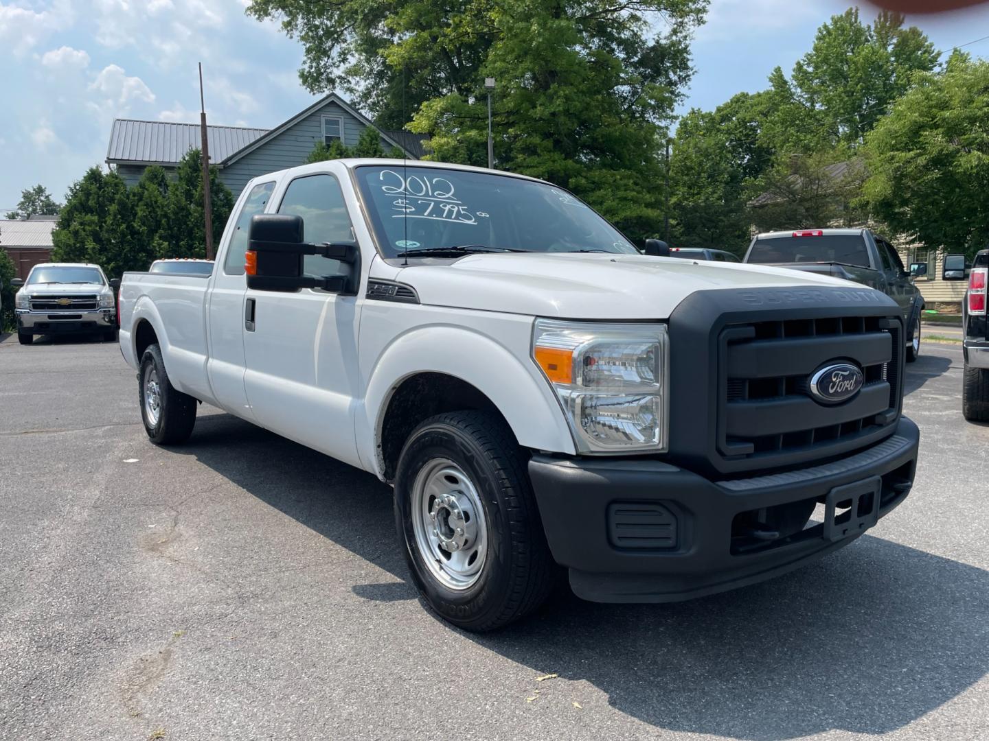 2012 White Ford F-250 SD Lariat SuperCab 2WD (1FT7X2A67CE) with an 6.2L V8 OHV 16V engine, 6-Speed Automatic transmission, located at 101 N. Main Street, Muncy, PA, 17756, (570) 546-5462, 41.207691, -76.785942 - Photo#0