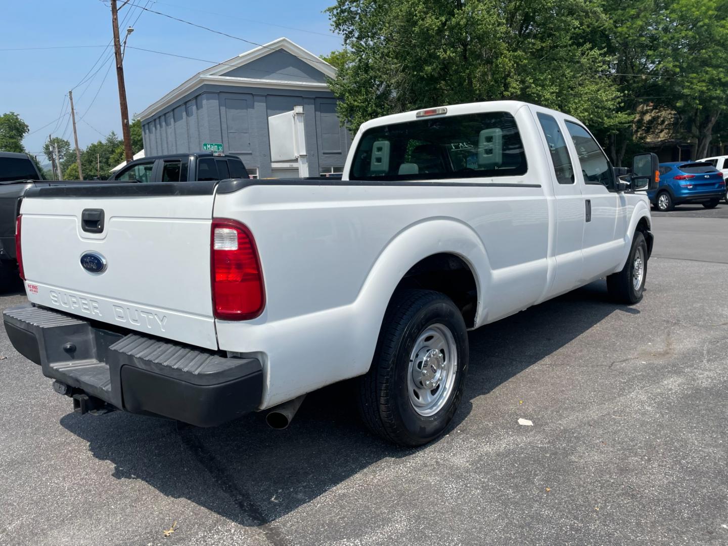 2012 White Ford F-250 SD Lariat SuperCab 2WD (1FT7X2A67CE) with an 6.2L V8 OHV 16V engine, 6-Speed Automatic transmission, located at 101 N. Main Street, Muncy, PA, 17756, (570) 546-5462, 41.207691, -76.785942 - Photo#3