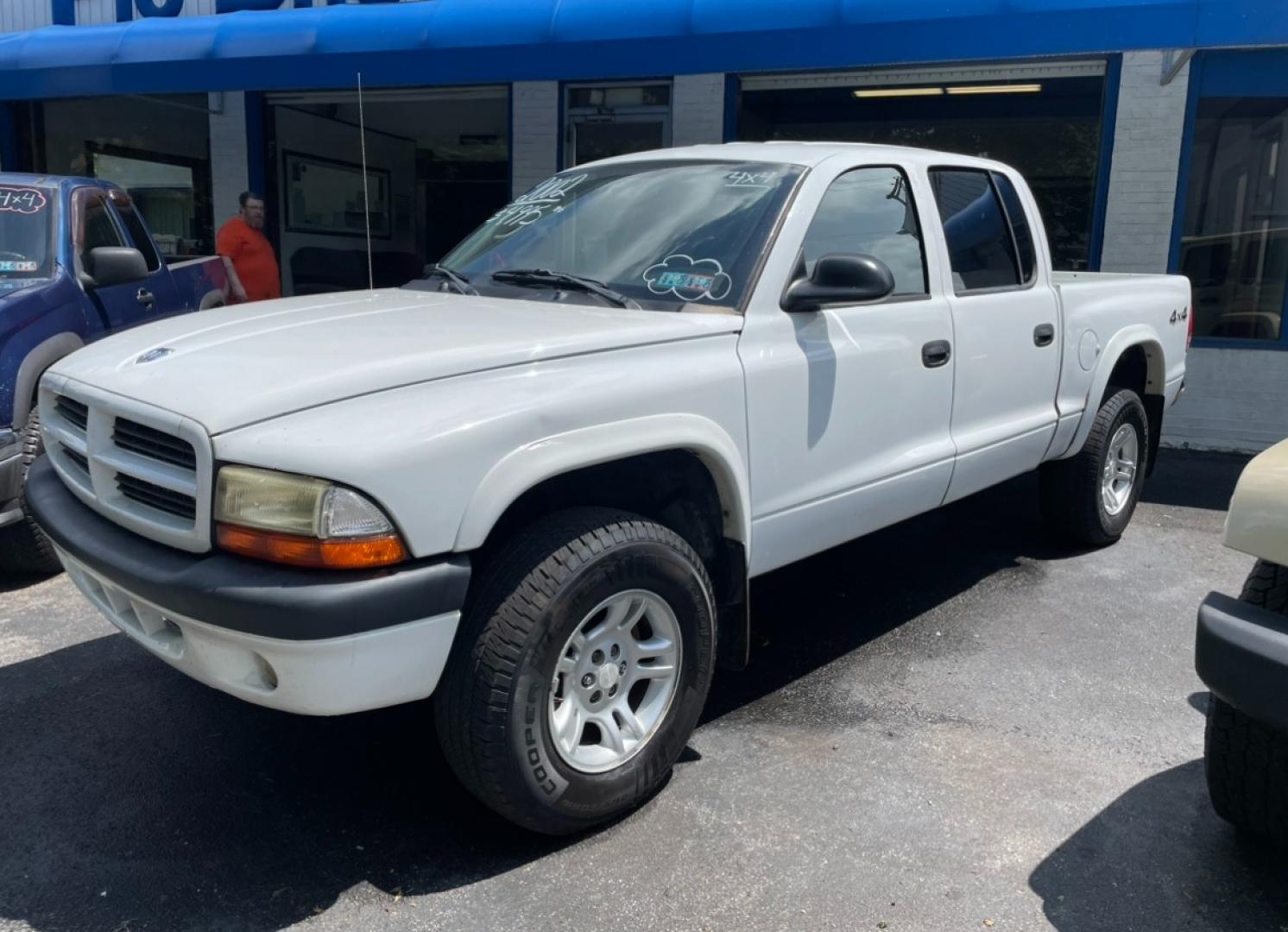 2003 White Dodge Dakota Sport Plus Quad Cab 4WD (1D7HG38X33S) with an 3.9L V6 OHV 12V engine, located at 101 N. Main Street, Muncy, PA, 17756, (570) 546-5462, 41.207691, -76.785942 - Photo#0