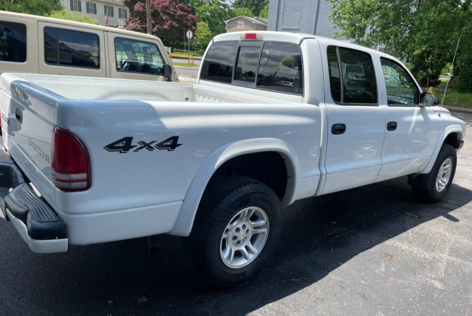 2003 White Dodge Dakota Sport Plus Quad Cab 4WD (1D7HG38X33S) with an 3.9L V6 OHV 12V engine, located at 101 N. Main Street, Muncy, PA, 17756, (570) 546-5462, 41.207691, -76.785942 - Photo#3