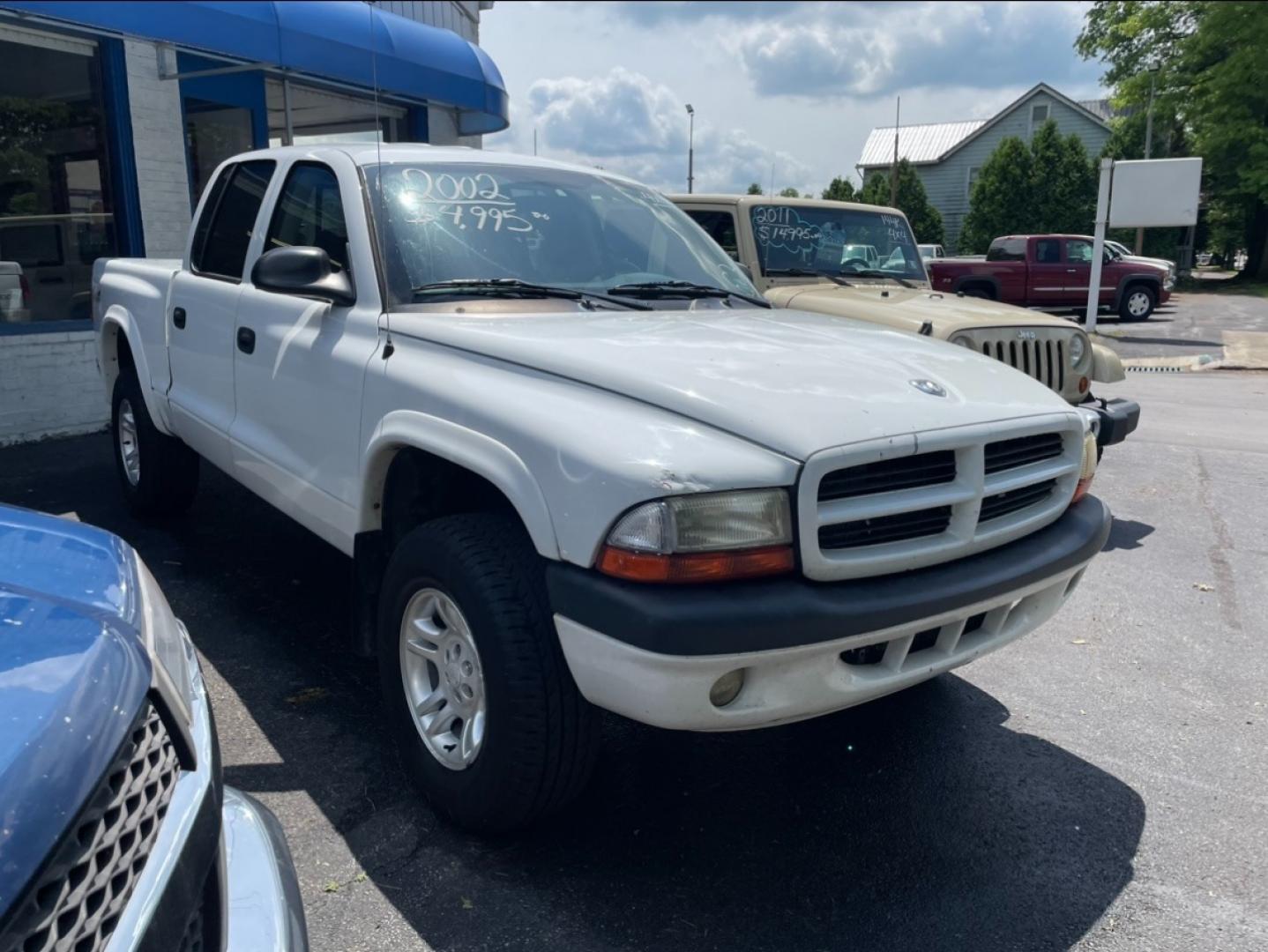 2003 White Dodge Dakota Sport Plus Quad Cab 4WD (1D7HG38X33S) with an 3.9L V6 OHV 12V engine, located at 101 N. Main Street, Muncy, PA, 17756, (570) 546-5462, 41.207691, -76.785942 - Photo#1