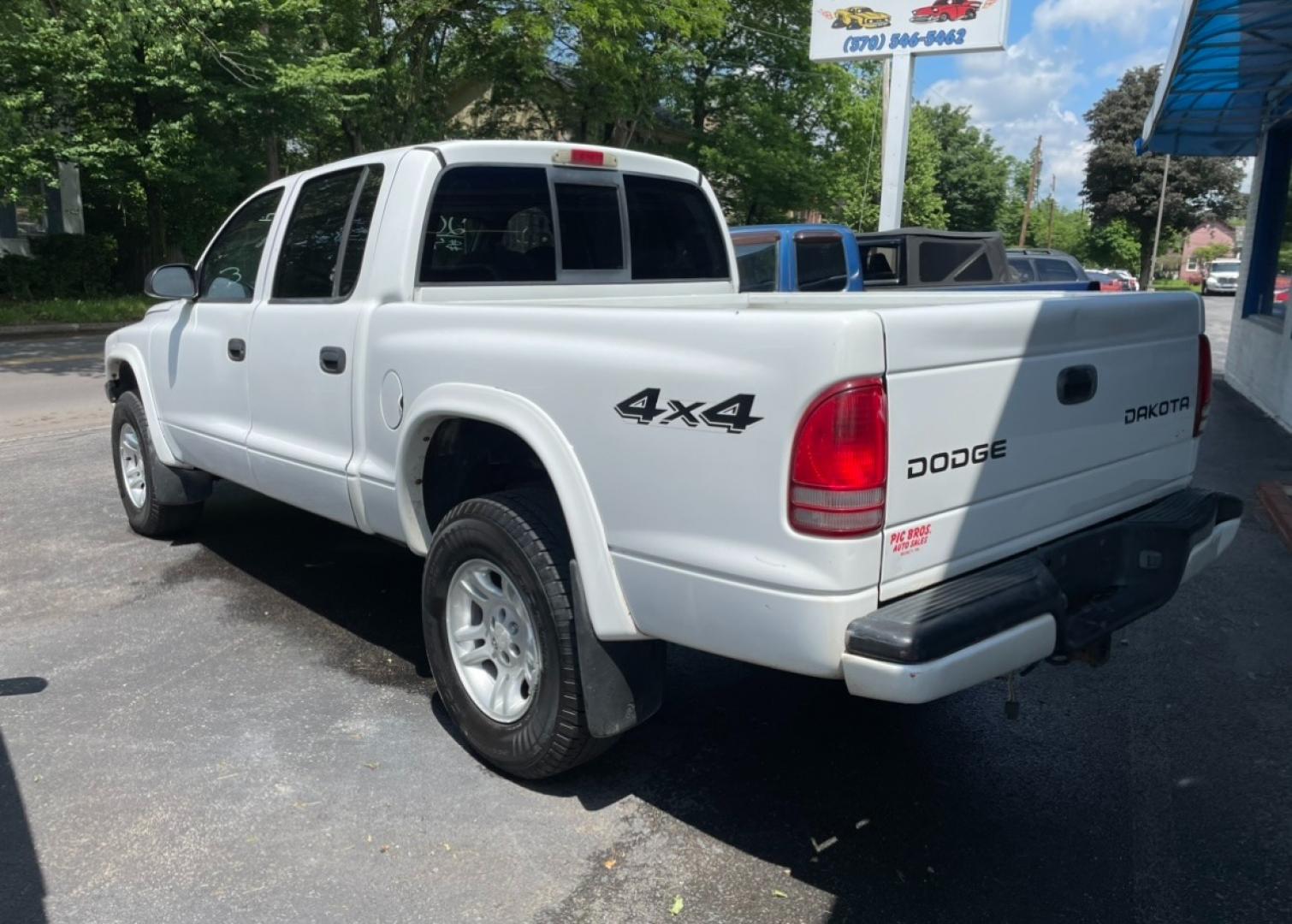 2003 White Dodge Dakota Sport Plus Quad Cab 4WD (1D7HG38X33S) with an 3.9L V6 OHV 12V engine, located at 101 N. Main Street, Muncy, PA, 17756, (570) 546-5462, 41.207691, -76.785942 - Photo#2