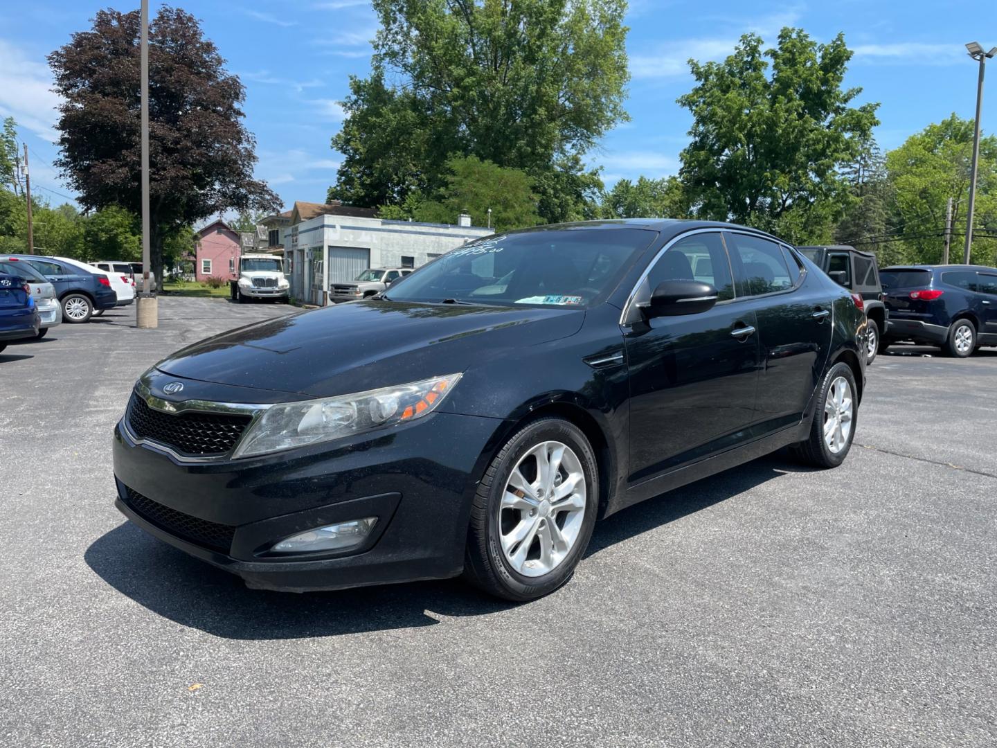 2012 black Kia Optima EX (5XXGN4A77CG) with an 2.4L L4 DOHC 16V engine, 6-Speed Automatic transmission, located at 101 N. Main Street, Muncy, PA, 17756, (570) 546-5462, 41.207691, -76.785942 - Photo#1