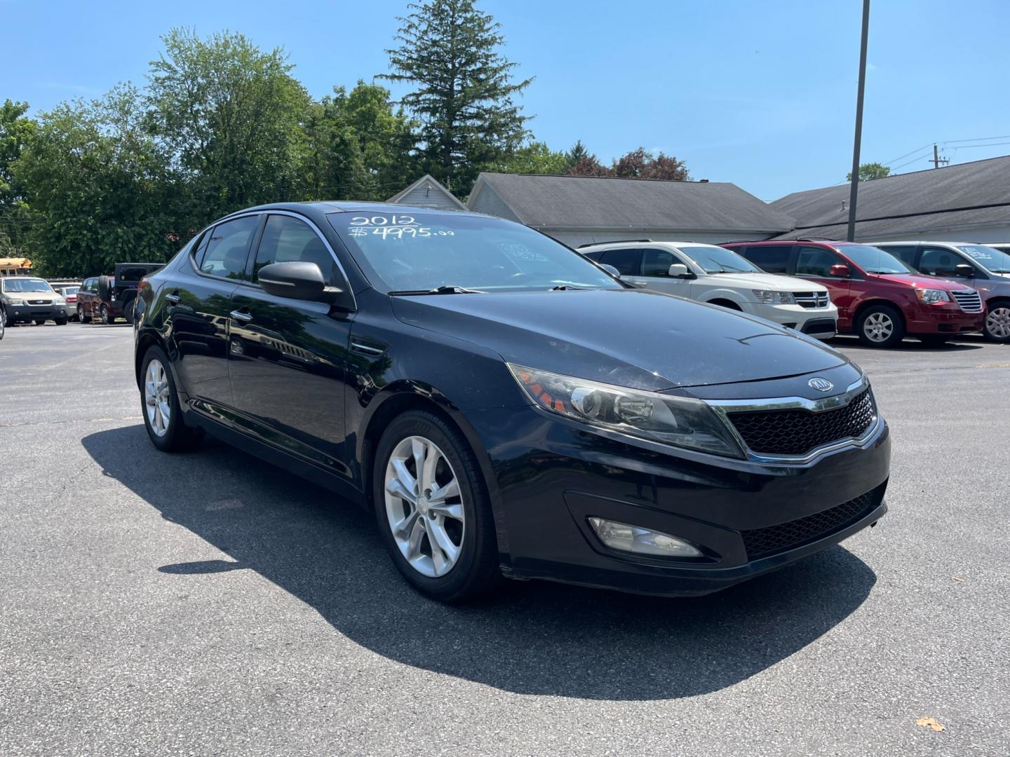 2012 black Kia Optima EX (5XXGN4A77CG) with an 2.4L L4 DOHC 16V engine, 6-Speed Automatic transmission, located at 101 N. Main Street, Muncy, PA, 17756, (570) 546-5462, 41.207691, -76.785942 - Photo#0