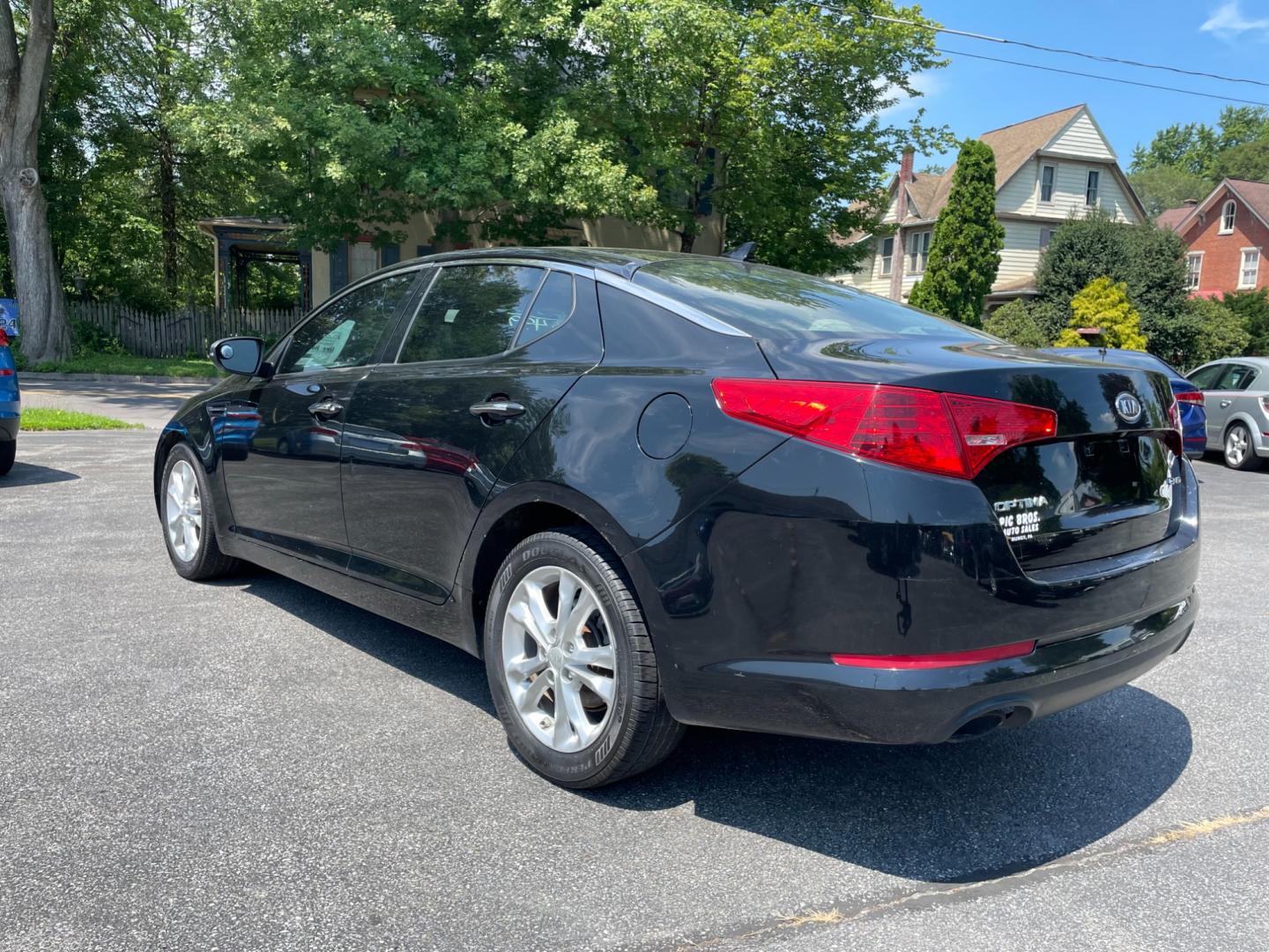 2012 black Kia Optima EX (5XXGN4A77CG) with an 2.4L L4 DOHC 16V engine, 6-Speed Automatic transmission, located at 101 N. Main Street, Muncy, PA, 17756, (570) 546-5462, 41.207691, -76.785942 - Photo#3