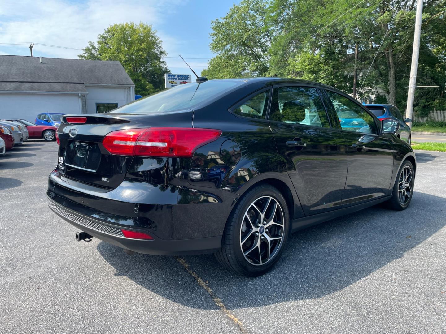 2018 black Ford Focus SEL Sedan (1FADP3H29JL) with an 2.0L L4 DOHC 16V engine, located at 101 N. Main Street, Muncy, PA, 17756, (570) 546-5462, 41.207691, -76.785942 - Photo#2