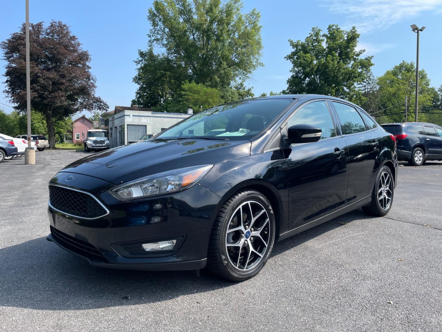 2018 black Ford Focus SEL Sedan (1FADP3H29JL) with an 2.0L L4 DOHC 16V engine, located at 101 N. Main Street, Muncy, PA, 17756, (570) 546-5462, 41.207691, -76.785942 - Photo#0