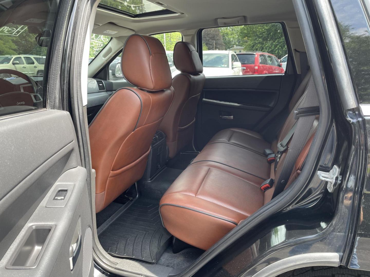 2008 black Jeep Grand Cherokee Overland 4WD (1J8HR68258C) with an 5.7L V8 OHV 16V engine, 5-Speed Automatic Overdrive transmission, located at 101 N. Main Street, Muncy, PA, 17756, (570) 546-5462, 41.207691, -76.785942 - Photo#8