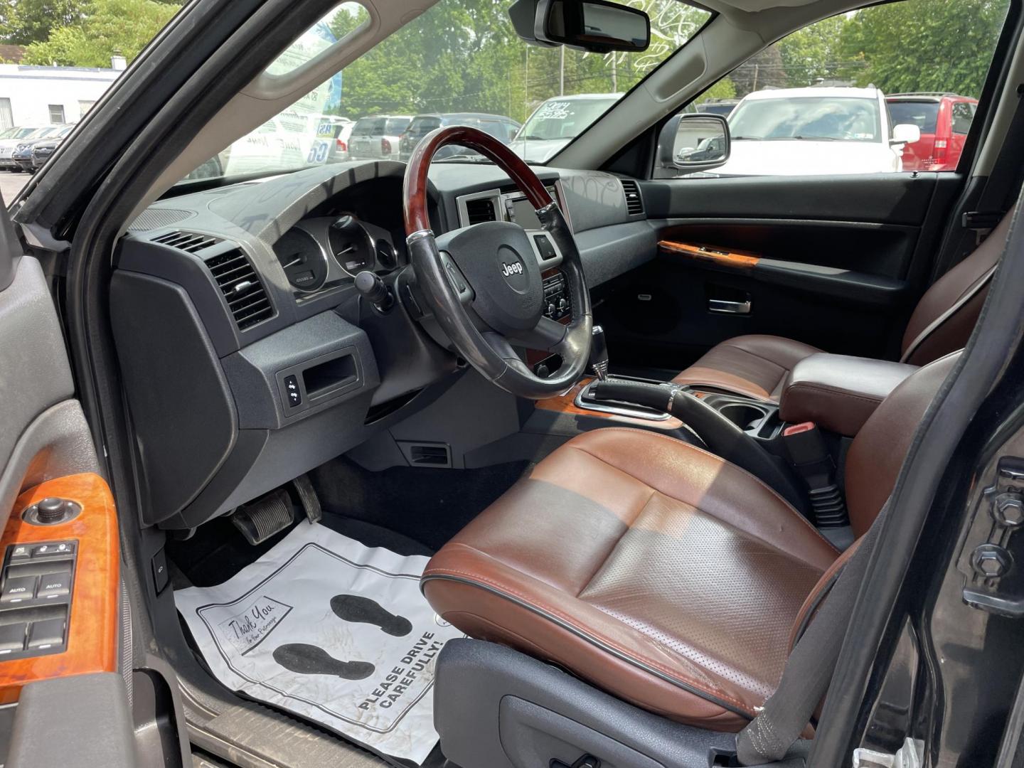 2008 black Jeep Grand Cherokee Overland 4WD (1J8HR68258C) with an 5.7L V8 OHV 16V engine, 5-Speed Automatic Overdrive transmission, located at 101 N. Main Street, Muncy, PA, 17756, (570) 546-5462, 41.207691, -76.785942 - Photo#7