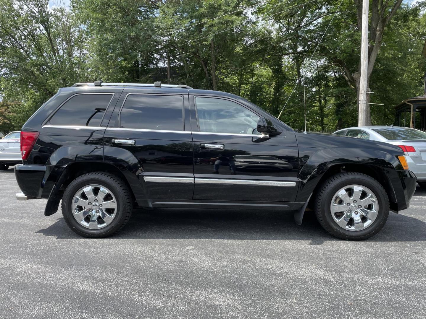 2008 black Jeep Grand Cherokee Overland 4WD (1J8HR68258C) with an 5.7L V8 OHV 16V engine, 5-Speed Automatic Overdrive transmission, located at 101 N. Main Street, Muncy, PA, 17756, (570) 546-5462, 41.207691, -76.785942 - Photo#1