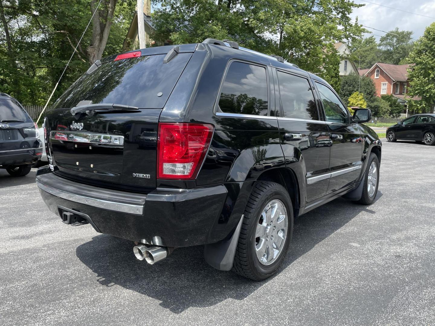 2008 black Jeep Grand Cherokee Overland 4WD (1J8HR68258C) with an 5.7L V8 OHV 16V engine, 5-Speed Automatic Overdrive transmission, located at 101 N. Main Street, Muncy, PA, 17756, (570) 546-5462, 41.207691, -76.785942 - Photo#4