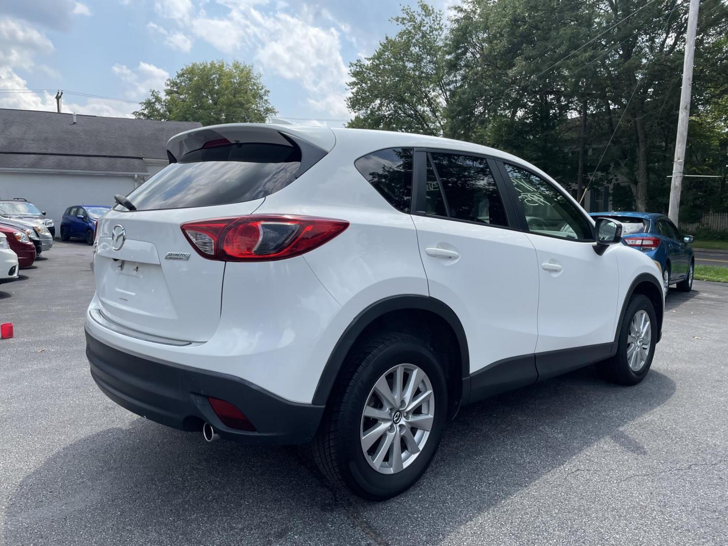 2014 Mazda CX-5 Touring AWD (JM3KE4CY0E0) with an 2.5L L4 DOHC 16V engine, 6-Speed Automatic transmission, located at 101 N. Main Street, Muncy, PA, 17756, (570) 546-5462, 41.207691, -76.785942 - Photo#3