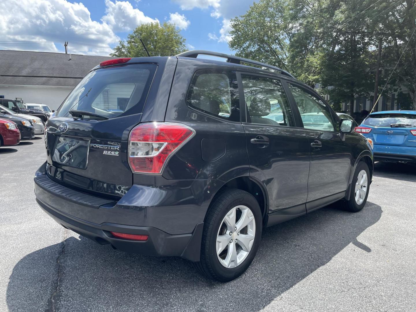 2015 Subaru Forester 2.5i Premium (JF2SJABC6FH) with an 2.5L H4 SOHC 16V engine, 6-Speed Automatic transmission, located at 101 N. Main Street, Muncy, PA, 17756, (570) 546-5462, 41.207691, -76.785942 - Photo#2