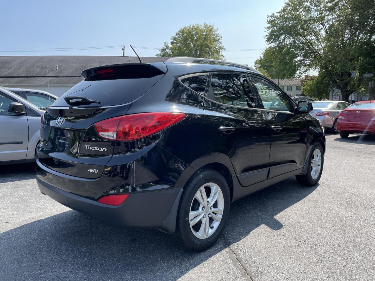 2011 Hyundai Tucson Limited Auto AWD (KM8JUCAC7BU) with an 2.4L L4 DOHC 16V engine, 6-Speed Automatic transmission, located at 101 N. Main Street, Muncy, PA, 17756, (570) 546-5462, 41.207691, -76.785942 - Photo#3