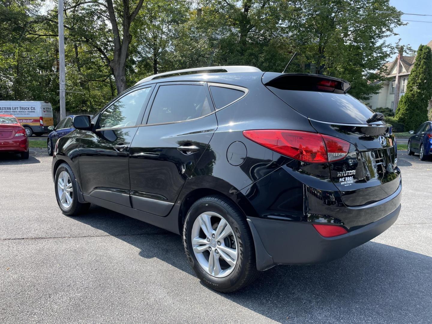 2011 Hyundai Tucson Limited Auto AWD (KM8JUCAC7BU) with an 2.4L L4 DOHC 16V engine, 6-Speed Automatic transmission, located at 101 N. Main Street, Muncy, PA, 17756, (570) 546-5462, 41.207691, -76.785942 - Photo#2