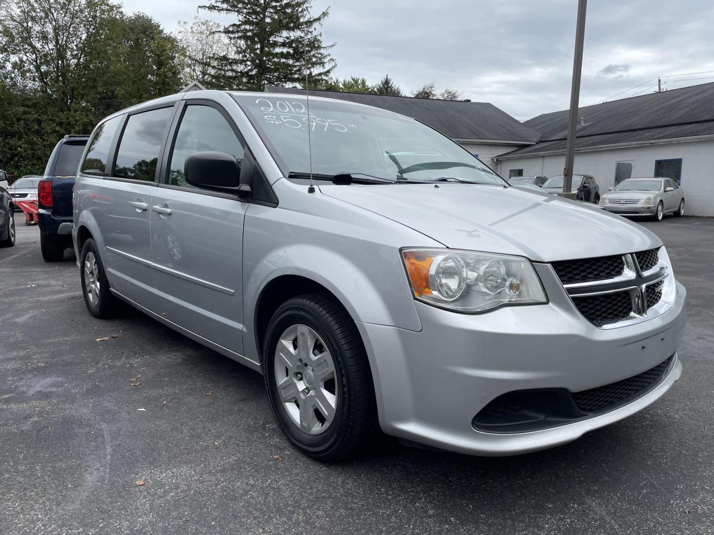 2012 Dodge Grand Caravan SE (2C4RDGBG2CR) with an 3.6L V6 DOHC 24V engine, 6-Speed Automatic transmission, located at 101 N. Main Street, Muncy, PA, 17756, (570) 546-5462, 41.207691, -76.785942 - Photo#1