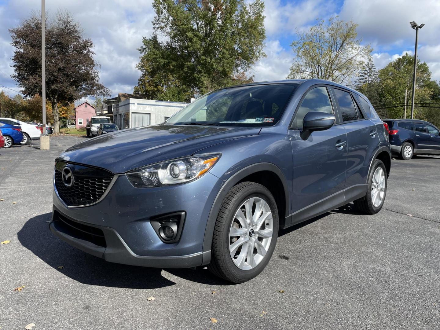 2015 blue Mazda CX-5 Grand Touring AWD (JM3KE4DY4F0) with an 2.5L L4 DOHC 16V engine, 6-Speed Automatic transmission, located at 101 N. Main Street, Muncy, PA, 17756, (570) 546-5462, 41.207691, -76.785942 - Photo#0