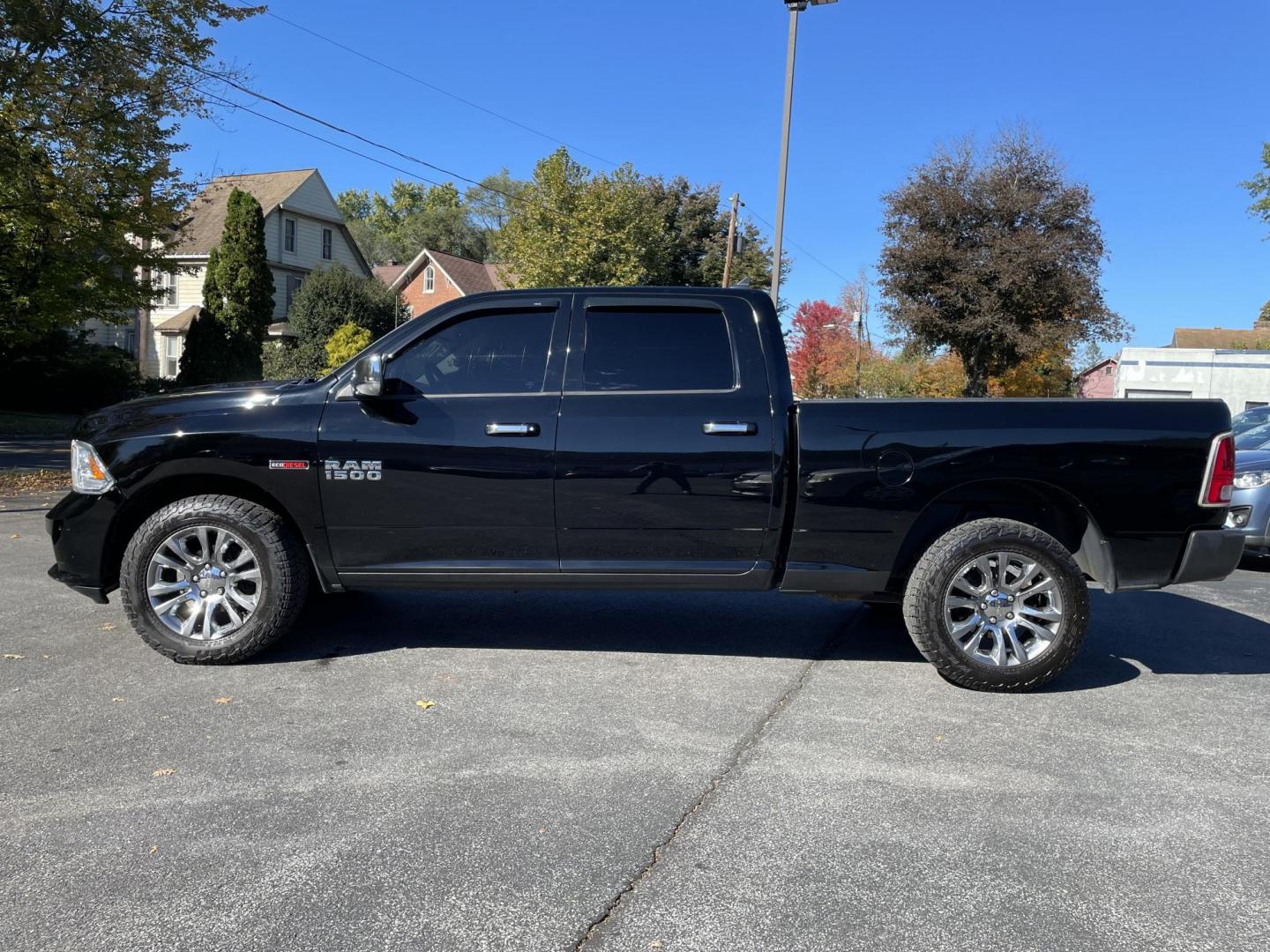 2014 black RAM 1500 Laramie Limited Longhorn Edition Crew Cab LWB 4WD (1C6RR7WM2ES) with an 3.0L V6 DIESEL engine, 6-Speed Automatic transmission, located at 101 N. Main Street, Muncy, PA, 17756, (570) 546-5462, 41.207691, -76.785942 - Photo#4