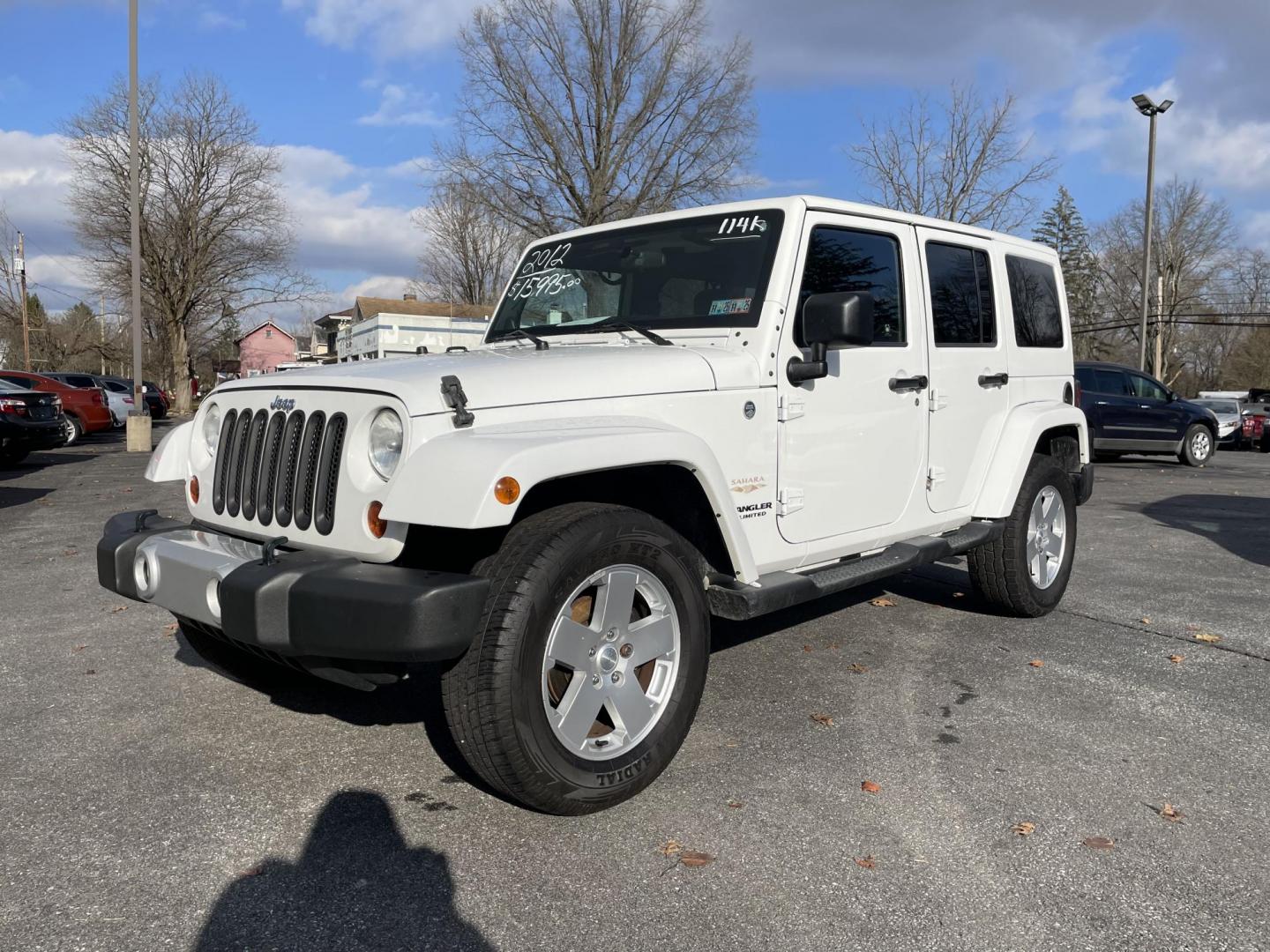 2012 Jeep Wrangler Unlimited Sahara 4WD (1C4BJWEG7CL) with an 3.6L V6 DOHC 24V FFV engine, located at 101 N. Main Street, Muncy, PA, 17756, (570) 546-5462, 41.207691, -76.785942 - Photo#0