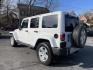 2012 Jeep Wrangler Unlimited Sahara 4WD (1C4BJWEG7CL) with an 3.6L V6 DOHC 24V FFV engine, located at 101 N. Main Street, Muncy, PA, 17756, (570) 546-5462, 41.207691, -76.785942 - Photo#2