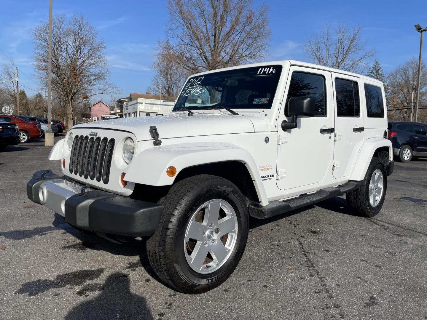 2012 Jeep Wrangler Unlimited Sahara 4WD (1C4BJWEG7CL) with an 3.6L V6 DOHC 24V FFV engine, located at 101 N. Main Street, Muncy, PA, 17756, (570) 546-5462, 41.207691, -76.785942 - Photo#0