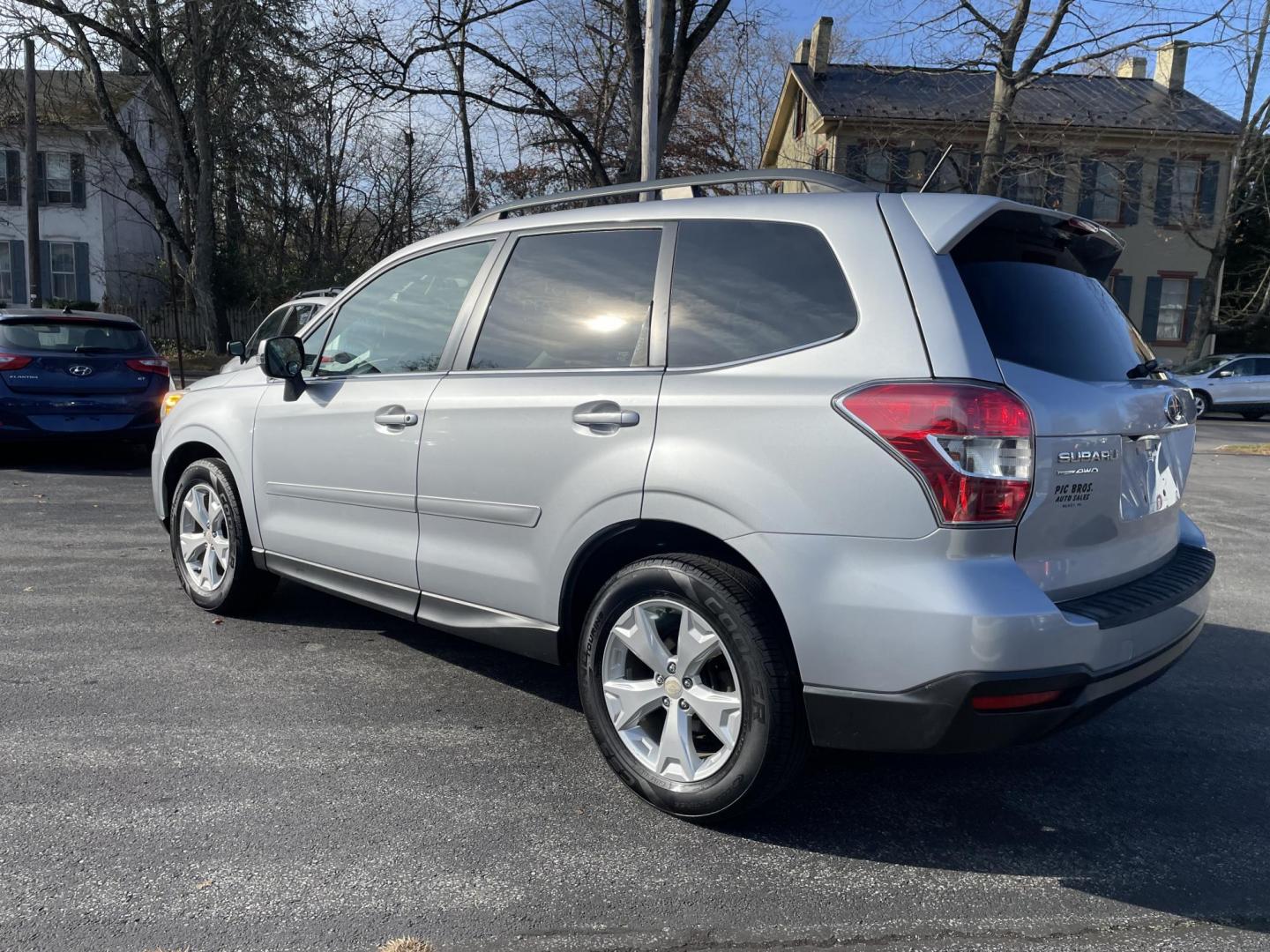 2014 Subaru Forester 2.5i Touring (JF2SJAPC5EH) with an 2.5L H4 SOHC 16V engine, 6-Speed Automatic transmission, located at 101 N. Main Street, Muncy, PA, 17756, (570) 546-5462, 41.207691, -76.785942 - Photo#1