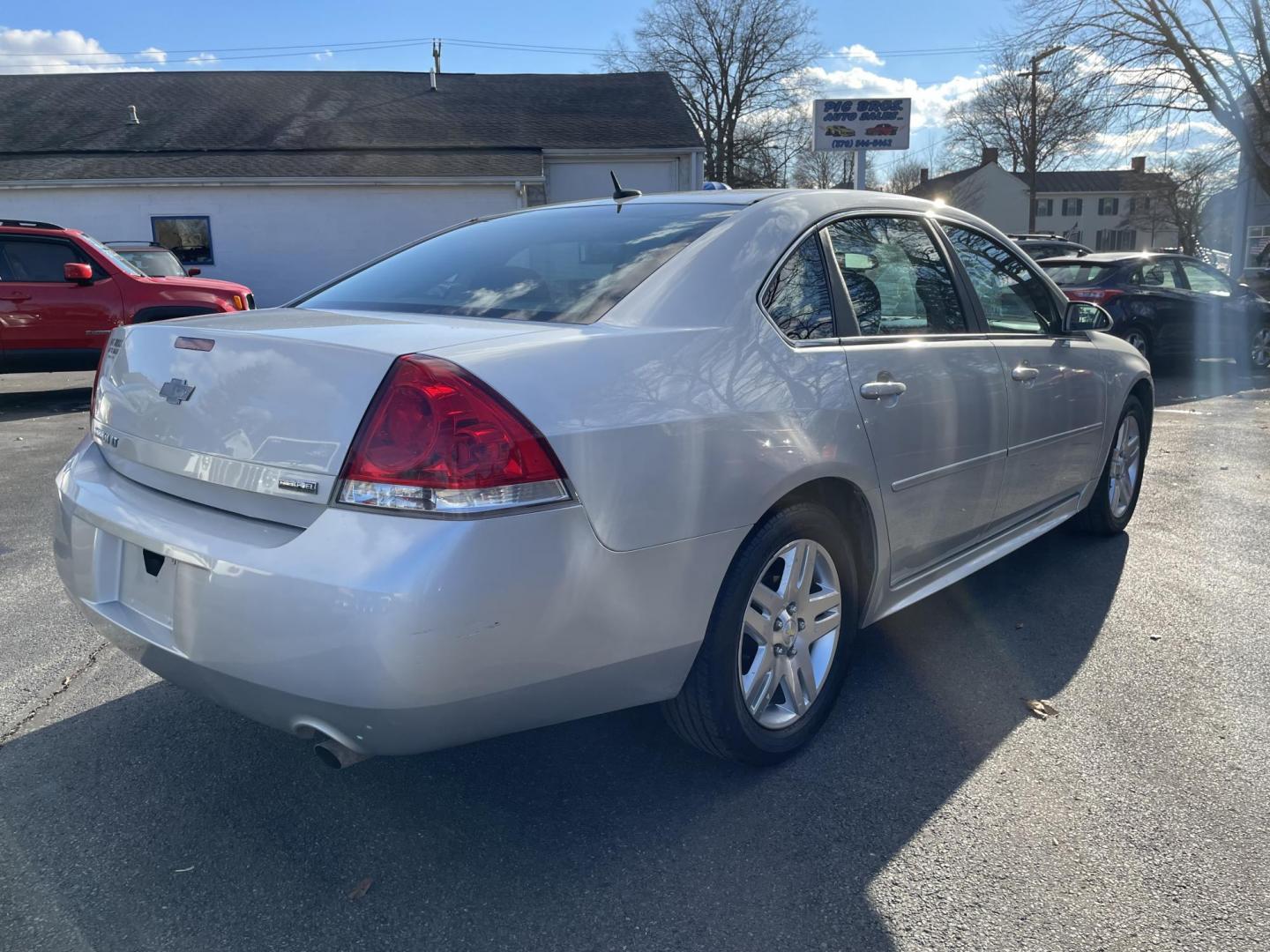 2013 Chevrolet Impala LT (Fleet) (2G1WG5E30D1) with an 3.6L V6 DOHC 16V FFV engine, 6-Speed Automatic transmission, located at 101 N. Main Street, Muncy, PA, 17756, (570) 546-5462, 41.207691, -76.785942 - Photo#3