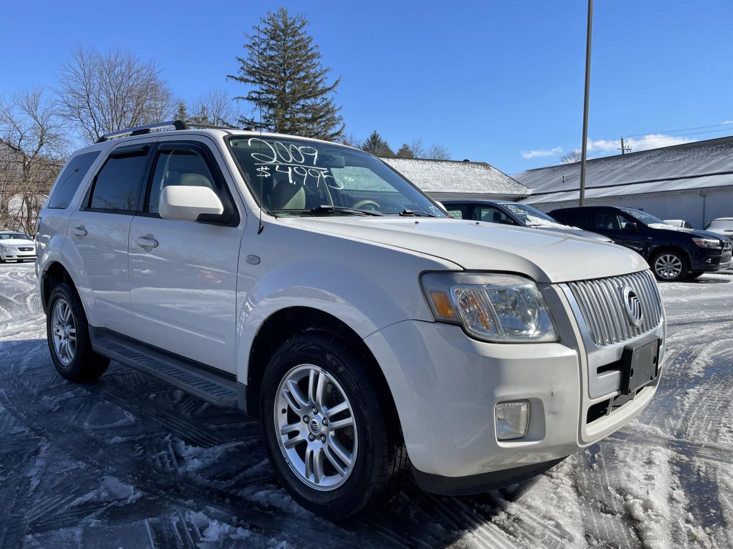 2009 Mercury Mariner Premier V6 4WD (4M2CU97G49K) with an 3.0L V6 DOHC 24V engine, 6-Speed Automatic transmission, located at 101 N. Main Street, Muncy, PA, 17756, (570) 546-5462, 41.207691, -76.785942 - Photo#1