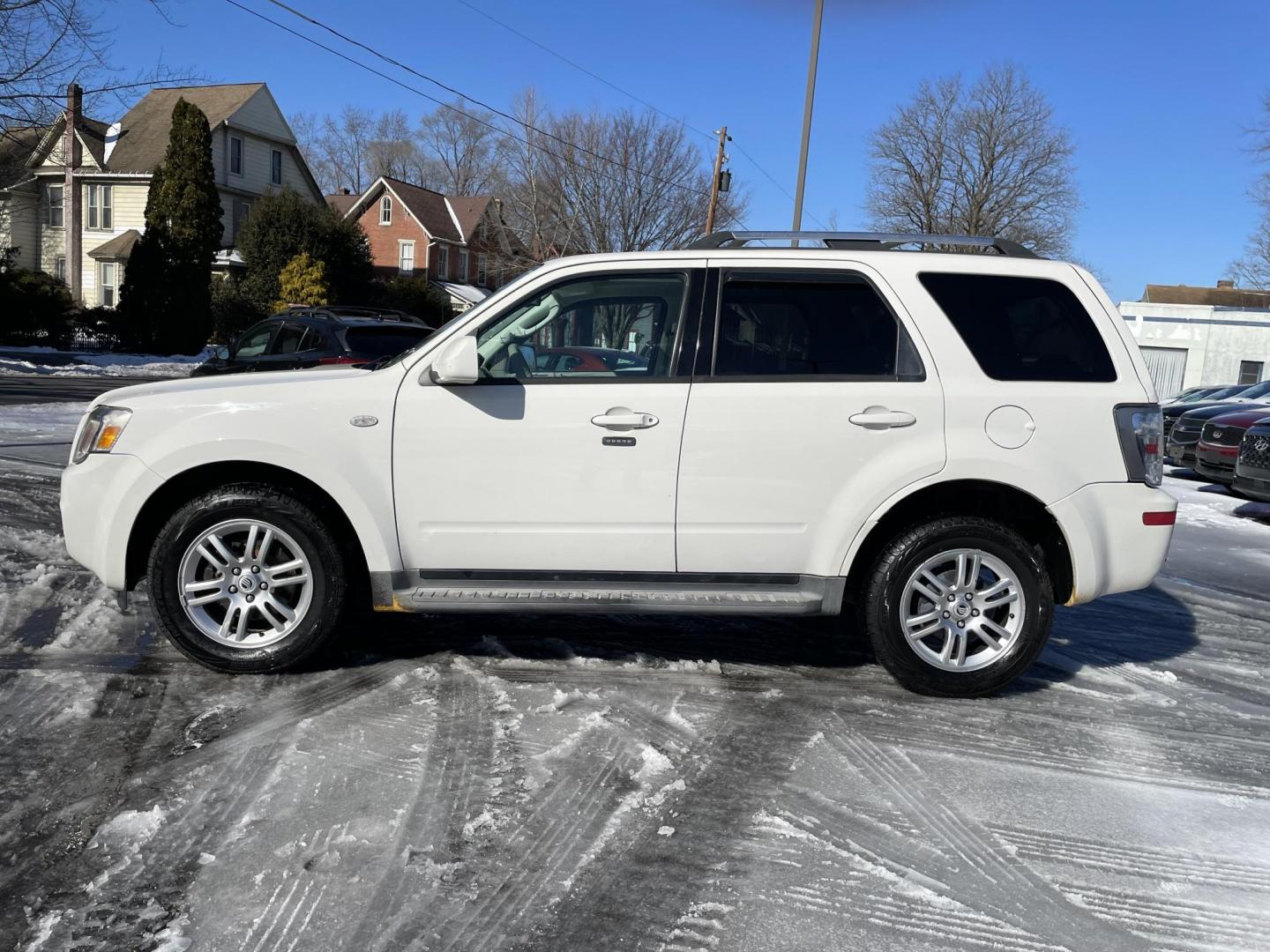 2009 Mercury Mariner Premier V6 4WD (4M2CU97G49K) with an 3.0L V6 DOHC 24V engine, 6-Speed Automatic transmission, located at 101 N. Main Street, Muncy, PA, 17756, (570) 546-5462, 41.207691, -76.785942 - Photo#2