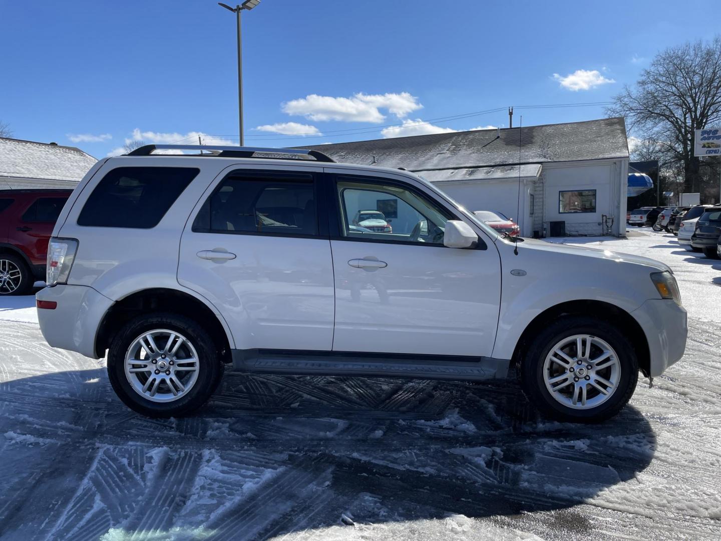 2009 Mercury Mariner Premier V6 4WD (4M2CU97G49K) with an 3.0L V6 DOHC 24V engine, 6-Speed Automatic transmission, located at 101 N. Main Street, Muncy, PA, 17756, (570) 546-5462, 41.207691, -76.785942 - Photo#3