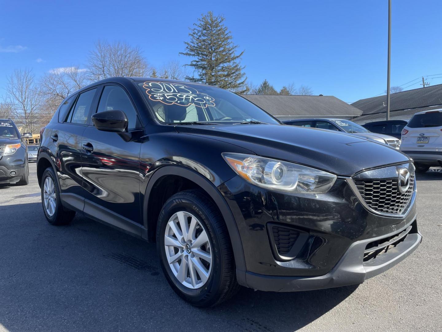 2013 Mazda CX-5 Sport (JM3KE2BE5D0) with an 2.0L L4 DOHC 16V engine, located at 101 N. Main Street, Muncy, PA, 17756, (570) 546-5462, 41.207691, -76.785942 - Photo#1